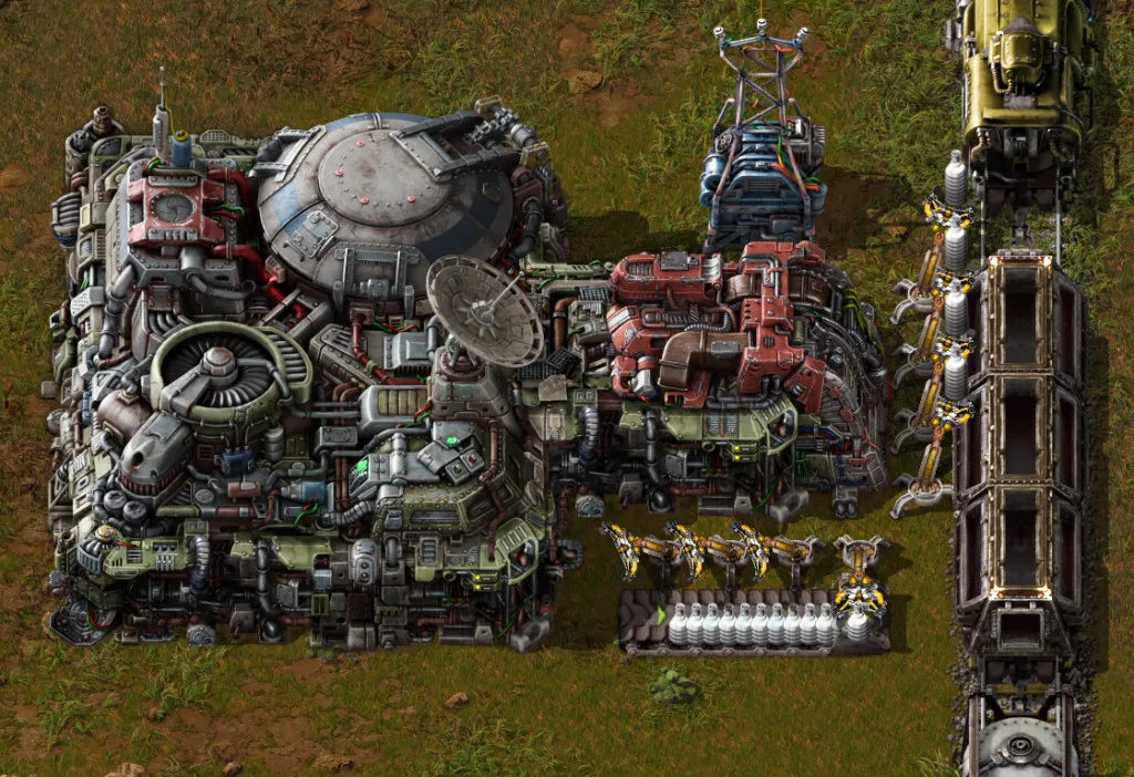 Factorio 2.1 screenshot of the new landing pad unloading bay, with inserters taking items out of the cargo bay.